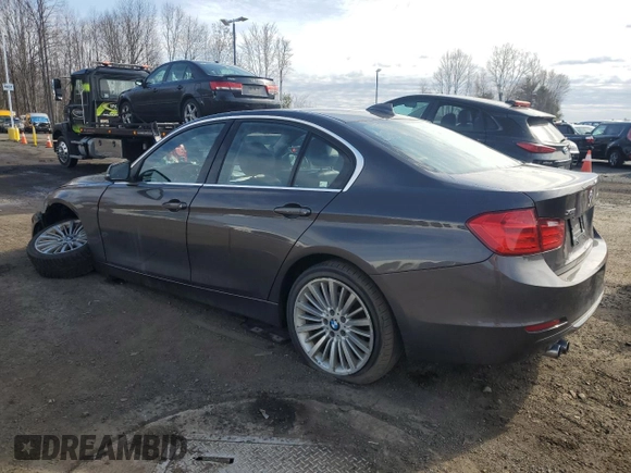 2015 BMW 3 Series 328i xDrive with VIN WBA3B3C51FF547944, listed as a Copart auction lot 50456555 with 102,745 mi miles and Salvage title. Bid and sale history available at DreamBid. Image 2.
