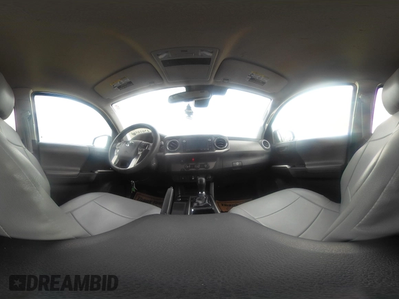 2018 Toyota Tacoma SR5 with VIN 3TMAZ5CNXJM069212, listed as a IAAI auction lot 42010564 with 73,825 mi miles and . Bid and sale history available at DreamBid. Image 18.