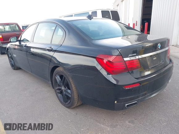 2015 BMW 7 Series 750Li xDrive with VIN WBAYF8C55FD654949, listed as a IAAI auction lot 41659763 with 91,837 mi miles and . Bid and sale history available at carsss.com. Image 3.