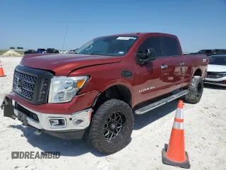 2017 Nissan Titan XD PRO-4X with VIN 1N6BA1F48HN516608, listed as a Copart auction lot 51453465 with 100,767 mi miles and Salvage Title. Bid and sale history available at carsss.com. Image 1.