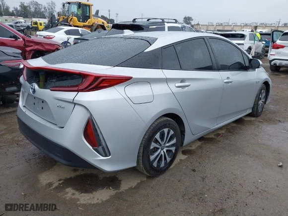 2021 Toyota Prius Prime LE with VIN JTDKAMFP9M3188569, listed as a IAAI auction lot 41712793 with 144,722 mi miles. Bid and sale history available at carsss.com. Image 4.
