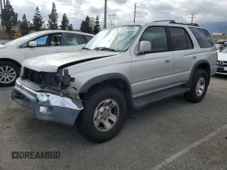 2000 Toyota 4Runner SR5 z VIN JT3GN86R1Y0168993, wystawiony jako Copart lot #57155865 z przebiegiem 193 464 mil mil oraz Czysty tytuł • Clean title. Historia ofert i sprzedaży dostępna na DreamBid. Obrazek 1.