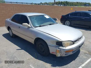 1996 Toyota Camry DX with VIN 4T1BG12K5TU734831, listed as a IAAI auction lot 42538657 with 243,398 mi miles and . Bid and sale history available at DreamBid. Image 1.