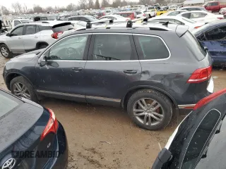 2015 Volkswagen Touareg Sport with VIN WVGEF9BP0FD003335, listed as a Copart auction lot 85151024 with 159,336 mi miles and Clean title. Bid and sale history available at DreamBid. Image 2.