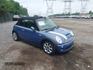 2006 MINI Convertible S with VIN WMWRH33516TL93102, listed as a IAAI auction lot 42529434 with 123,292 mi miles and . Bid and sale history available at DreamBid. Image 1.