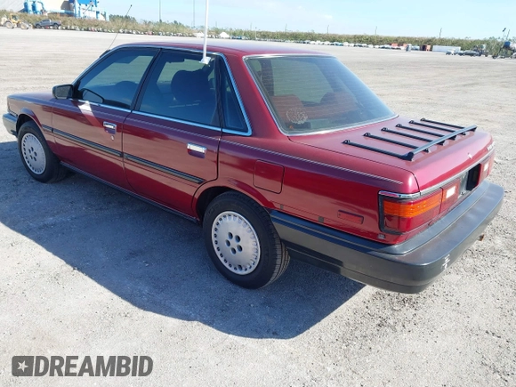 1989 Toyota Camry DLX с VIN 4T1SV21E9KU059104, выставлен на аукционе IAAI как лот 41014925 с пробегом 312 844 миль миль и . История ставок и продаж доступна на DreamBid. Изображение 3.