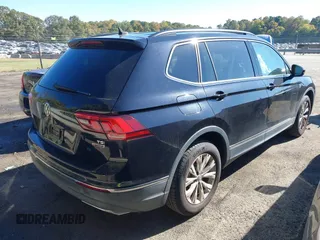 2018 Volkswagen Tiguan SEL z VIN 3VV2B7AX9JM142564, wystawiony jako IAAI lot #40630666 z przebiegiem 86 040 mil mil oraz . Historia ofert i sprzedaży dostępna na DreamBid. Obrazek 4.