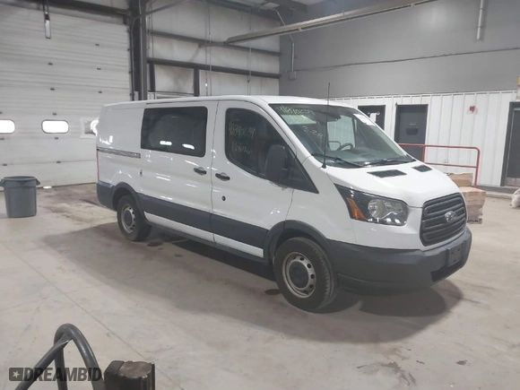 2016 Ford Transit Cargo Van with VIN 1FTYE1YM3GKA86534, listed as a IAAI auction lot 41890239 with 216,017 mi miles. Bid and sale history available at carsss.com. Image 1.