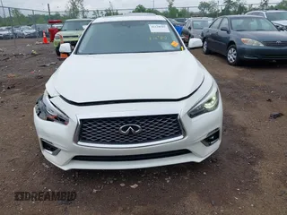 2018 Infiniti Q50 Luxe z VIN JN1EV7AR3JM445195, wystawiony jako IAAI lot #42228587 z przebiegiem 122 575 mil mil oraz . Historia ofert i sprzedaży dostępna na DreamBid. Obrazek 12.