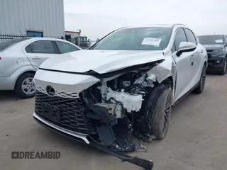 2024 Lexus RX 350 z VIN 2T2BAMBA3RC036220, wystawiony jako IAAI lot #41912482 z przebiegiem 5318 mil mil oraz . Historia ofert i sprzedaży dostępna na DreamBid. Obrazek 2.