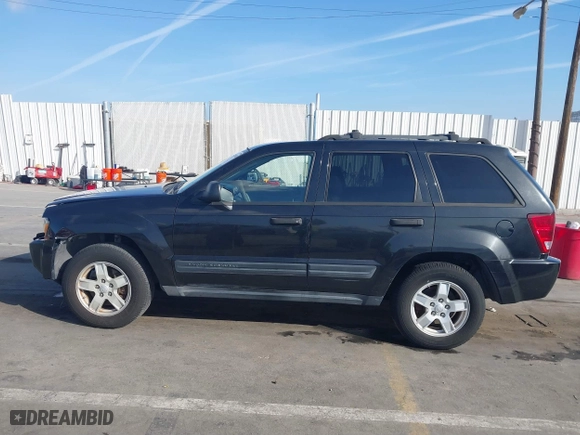 2005 Jeep Grand Cherokee Laredo with VIN 1J8GS48K95C615330, listed as a IAAI auction lot 41719101 with 152,186 mi miles. Bid and sale history available at carsss.com. Image 14.