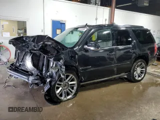 2013 Cadillac Escalade Premium with VIN 1GYS4CEF9DR306900, listed as a Copart auction lot 60152595 with 165,471 mi miles and Salvage title. Bid and sale history available at DreamBid. Image 1.