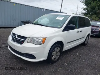 2011 Dodge Grand Caravan Cargo with VIN 2D4RN1AG5BR601684, listed as a IAAI auction lot 40406009 with 207,242 mi miles. Bid and sale history available at carsss.com. Image 2.