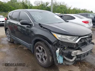 2017 Honda CR-V EX with VIN 7FARW1H59HE007171, listed as a IAAI auction lot 42033941 with 134,227 mi miles and . Bid and sale history available at carsss.com. Image 1.