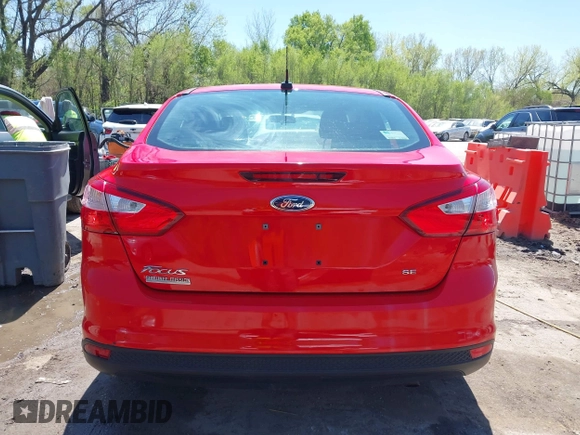 2012 Ford Focus SE z VIN 1FAHP3F23CL333598, wystawiony jako IAAI lot #41970172 z przebiegiem 209 969 mil mil oraz . Historia ofert i sprzedaży dostępna na DreamBid. Obrazek 17.