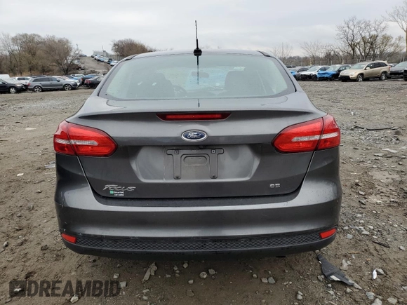 2018 Ford Focus SE with VIN 1FADP3F29JL206477, listed as a Copart auction lot 50410345 with 70,955 mi miles and Salvage Title. Bid and sale history available at DreamBid. Image 6.