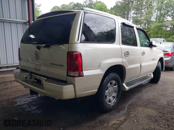 2003 Cadillac Escalade z VIN 1GYEK63NX3R241388, wystawiony jako IAAI lot #42227896 z przebiegiem 154 415 mil mil oraz . Historia ofert i sprzedaży dostępna na DreamBid. Obrazek 4.