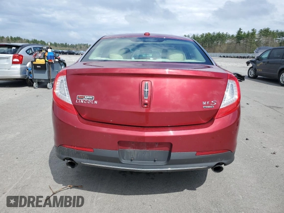 2013 Lincoln MKS EcoBoost with VIN 1LNHL9FT1DG609011, listed as a Copart auction lot 55793575 with Not provided miles and Salvage title. Bid and sale history available at DreamBid. Image 6.