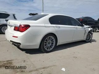 2015 BMW 7 Series 740Li with VIN WBAYE4C50FD138994, listed as a Copart auction lot 73342663 with 102,711 mi miles and . Bid and sale history available at DreamBid. Image 3.