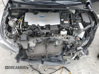 2021 Toyota Prius L Eco z VIN JTDKAMFU2M3148890, wystawiony jako Copart lot #60064065 z przebiegiem 58 226 mil mil oraz Szkoda całkowita • Salvage title. Historia ofert i sprzedaży dostępna na DreamBid. Obrazek 11.