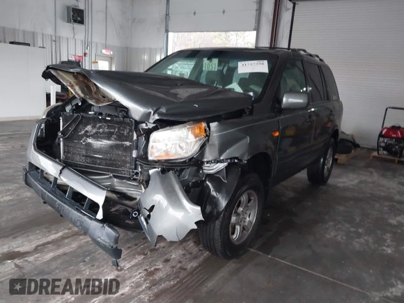 2007 Honda Pilot EX with VIN 2HKYF18447H527065, listed as a IAAI auction lot 41727398 with 147,121 mi miles. Bid and sale history available at carsss.com. Image 2.