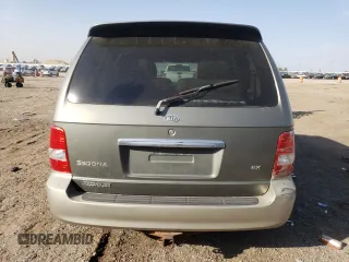 2005 Kia Sedona LX with VIN KNDUP132X56695902, listed as a Copart auction lot 73604104 with 109,676 mi miles and Salvage Title. Bid and sale history available at carsss.com. Image 6.