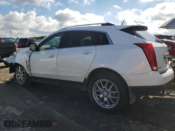 2014 Cadillac SRX Premium Collection z VIN 3GYFNGE31ES615593, wystawiony jako Copart lot #56785775 z przebiegiem 247 230 mil mil oraz Tytuł czysty. Historia ofert i sprzedaży dostępna na DreamBid. Obrazek 2.