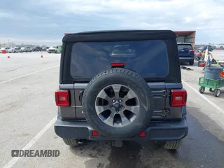 2019 Jeep Wrangler Unlimited Sahara with VIN 1C4HJXEN3KW622167, listed as a IAAI auction lot 41880702 with 72,928 mi miles and . Bid and sale history available at DreamBid. Image 17.