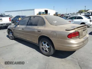 1998 Oldsmobile Intrigue GL z VIN 1G3WS52K1WF373652, wystawiony jako Copart lot #72822084 z przebiegiem 221 028 mil mil oraz Szkoda całkowita • Salvage title. Historia ofert i sprzedaży dostępna na DreamBid. Obrazek 2.
