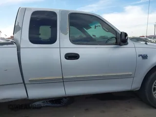 2001 Ford F-150 XL z VIN 1FTRX17W61NA73638, wystawiony jako IAAI lot #41543338 z przebiegiem Nie podano mil oraz . Historia ofert i sprzedaży dostępna na DreamBid. Obrazek 13.