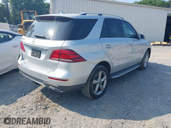 2018 Mercedes-Benz GLE 350 with VIN 4JGDA5JB4JB129369, listed as a IAAI auction lot 42388012 with 94,926 mi miles and . Bid and sale history available at DreamBid. Image 4.
