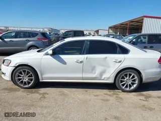 2014 Volkswagen Passat TDI SE w/Sunroof with VIN 1VWBN7A32EC016554, listed as a IAAI auction lot 41472156 with 178,149 mi miles. Bid and sale history available at carsss.com. Image 14.