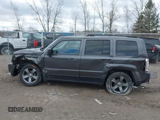 2015 Jeep Patriot High Altitude with VIN 1C4NJPFA2FD297575, listed as a IAAI auction lot 41848731 with 77,149 mi miles and . Bid and sale history available at DreamBid. Image 14.