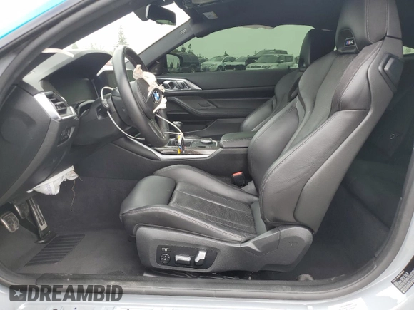 2021 BMW M4 with VIN WBS53AZ0XMCG52209, listed as a Copart auction lot 50234375 with 19,701 mi miles and Salvage title. Bid and sale history available at DreamBid. Image 7.