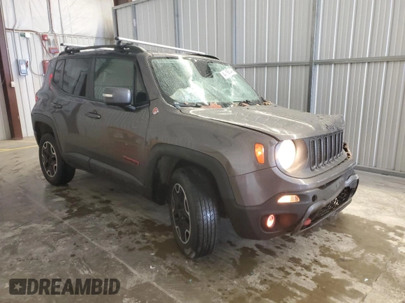 2017 Jeep Renegade Trailhawk with VIN ZACCJBCB4HPF09713, listed as a Copart auction lot 44865445 with 166,617 mi miles and Salvage title. Bid and sale history available at DreamBid. Image 4.