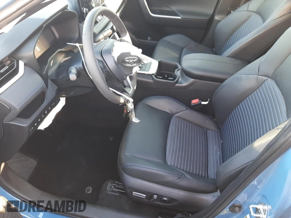 2023 Toyota RAV4 Hybrid XSE with VIN 2T3E6RFV4PW039496, listed as a Copart auction lot 39150774 with 13,533 mi miles and Salvage title. Bid and sale history available at DreamBid. Image 7.