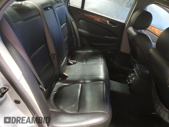 2004 Jaguar XJ with VIN SAJEA71C84SG07220, listed as a Copart auction lot 70916164 with 151,102 mi miles and Salvage Title. Bid and sale history available at carsss.com. Image 10.