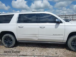 2018 Chevrolet Suburban Premier z VIN 1GNSKJKC6JR402075, wystawiony jako IAAI lot #42124796 z przebiegiem 156 900 mil mil oraz . Historia ofert i sprzedaży dostępna na DreamBid. Obrazek 14.
