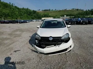 2014 Volkswagen Golf z VIN WVWDB7AJ5EW011768, wystawiony jako Copart lot #60351135 z przebiegiem 75 185 mil mil oraz Szkoda całkowita • Salvage title. Historia ofert i sprzedaży dostępna na DreamBid. Obrazek 14.