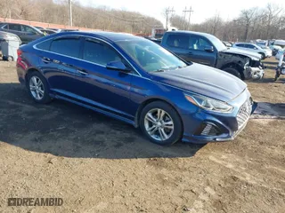 2019 Hyundai Sonata Sport with VIN 5NPE34AFXKH792154, listed as a IAAI auction lot 41328069 with 68,504 mi miles. Bid and sale history available at carsss.com. Image 1.