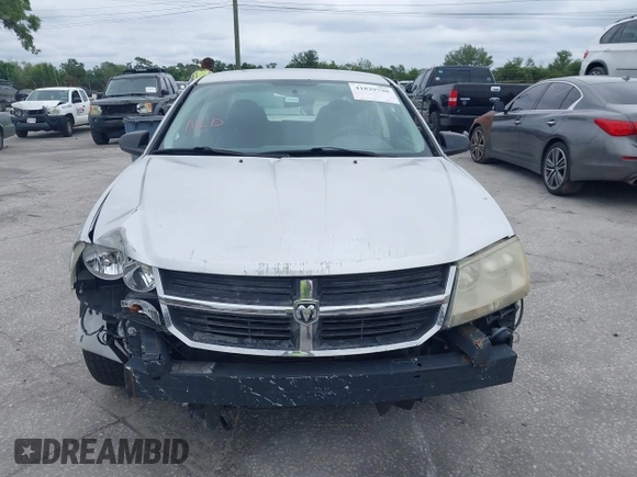 2008 Dodge Avenger SXT with VIN 1B3LC56K98N213958, listed as a IAAI auction lot 41829798 with 128,123 mi miles. Bid and sale history available at carsss.com. Image 12.