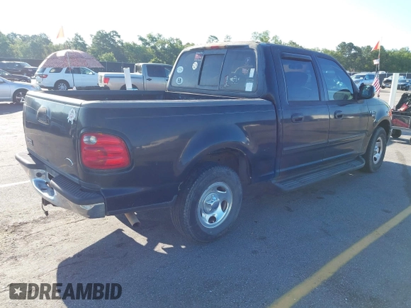 2001 Ford F-150 XLT z VIN 1FTRW07L61KC53030, wystawiony jako IAAI lot #42526499 z przebiegiem 121 675 mil mil oraz . Historia ofert i sprzedaży dostępna na DreamBid. Obrazek 4.