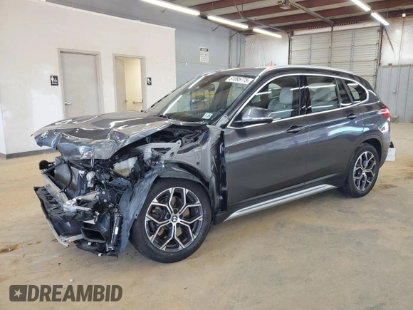 2021 BMW X1 xDrive28i with VIN WBXJG9C00M5S35249, listed as a Copart auction lot 61895775 with 34,641 mi miles and Salvage title. Bid and sale history available at DreamBid. Image 1.