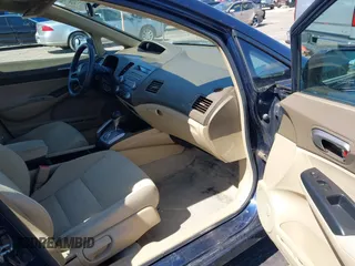 2006 Honda Civic LX with VIN 1HGFA16596L060058, listed as a IAAI auction lot 41959725 with 125,853 mi miles and . Bid and sale history available at DreamBid. Image 5.