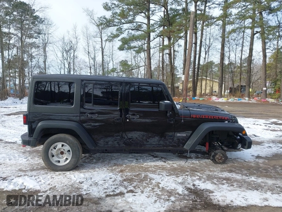 2017 Jeep Wrangler Unlimited Rubicon Recon z VIN 1C4BJWFG4HL723096, wystawiony jako IAAI lot #41393584 z przebiegiem 102 045 mil mil oraz . Historia ofert i sprzedaży dostępna na DreamBid. Obrazek 14.