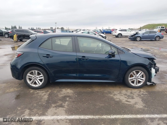 2021 Toyota Corolla Hatchback SE with VIN JTND4MBE8M3107240, listed as a IAAI auction lot 41570554 with 35,583 mi miles. Bid and sale history available at carsss.com. Image 14.