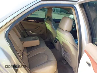 2009 Cadillac CTS RWD w/1SA with VIN 1G6DF577990141214, listed as a IAAI auction lot 42014205 with 237,986 mi miles. Bid and sale history available at carsss.com. Image 8.