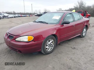 2004 Pontiac Grand Am SE with VIN 1G2NE52F14M652117, listed as a IAAI auction lot 41747762 with 187,422 mi miles. Bid and sale history available at carsss.com. Image 2.