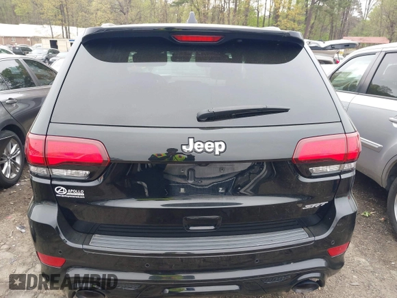 2017 Jeep Grand Cherokee SRT z VIN 1C4RJFDJ7HC683240, wystawiony jako IAAI lot #41919995 z przebiegiem 122 030 mil mil oraz . Historia ofert i sprzedaży dostępna na DreamBid. Obrazek 16.