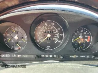 1986 Mercedes-Benz 560 with VIN WDBBA48D1GA037209, listed as a Copart auction lot 75417834 with 123,910 mi miles and Salvage Title. Bid and sale history available at carsss.com. Image 9.